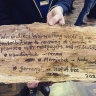 The Wurundjeri Woi Wurrung and Moreland City Council scroll handover with three Woi Wurrung words for the renaming of council were presented on traditional bark at a name changing ceremony.