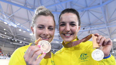 Annette Edmondson (left, pictured with fellow cyclist Rebecca Wiasak at the 2018 Commonwealth Games) is owed more than $2000.