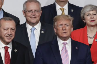 Turkish President Recep Tayyip Erdogan, Prime Minister Scott Morrison, US President Donald Trump and then UK PM Theresa May during the 'family photo' at the G20 Summit in Osaka. Trump is said to be deferential to Erdogan and Vladimir Putin, but brutal with May.