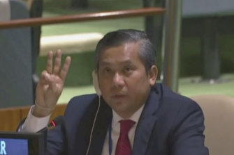 Myanmar Ambassador to the United Nations Kyaw Moe Tun flashes the three-fingered, a gesture of defiance used by protesters in Myanmar, at the end of his speech to the UN General Assembly in February. 