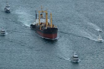 The Pong Su under arrest heading into Sydney, flanked by Police and Customs craft.