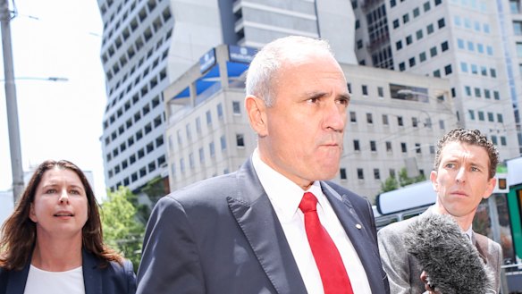 NAB chairman Ken Henry leaving the royal commission hearings in Melbourne late last year. 