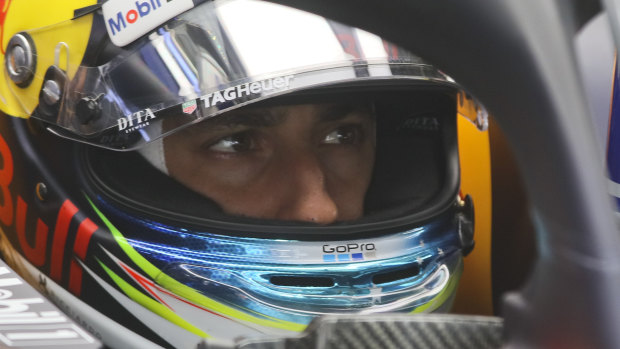 Penalised: Australian driver Daniel Ricciardo waits for the green light in pit lane during the Austrian GP.