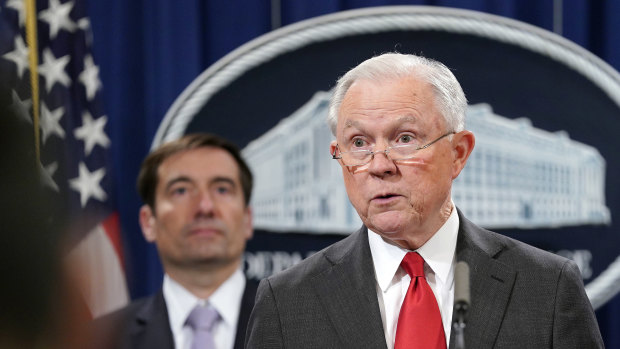 US Attorney-General Jeff Sessions announces a criminal law enforcement action involving China at the Department of Justice in Washington on Thursday.