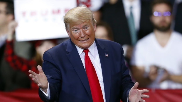 President Donald Trump speaks at a campaign rally in Battle Creek, Michigan, as the vote in the House was underway.