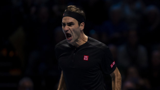 Roger Federer shows his emotion after beating Novak Djokovic in London.