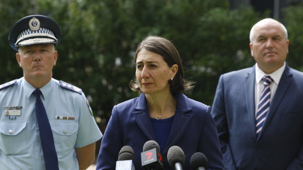 Police Commissioner Mick Fuller, Premier Gladys Berejiklian and Police Minister David Elliott on Saturday.