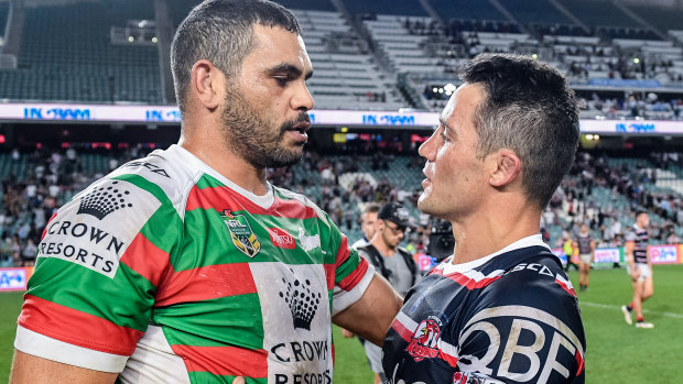 One awaits: Either Greg Inglis or Cooper Cronk will clash with their old coach in next week's grand final.