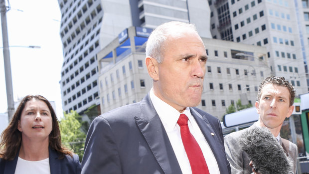 NAB chairman Ken Henry leaving the royal commission hearings in Melbourne late last year. 