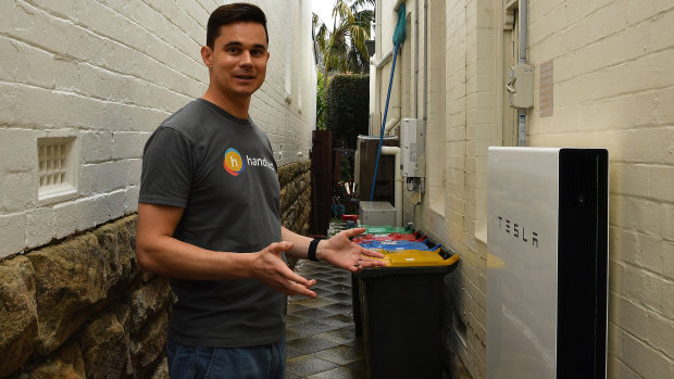 Carl Prins shows the Tesla Powerwall that is installed at his home in Waverley. 