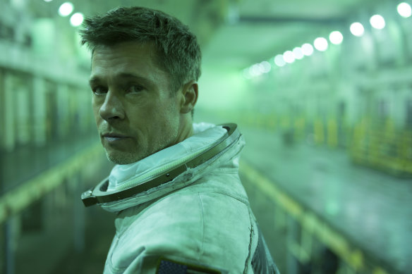 Brad Pitt in Ad Astra where he plays Roy McBride, an astronaut on an mission to find his absentee father. 