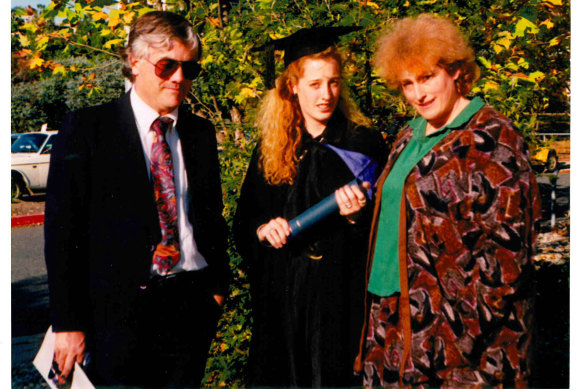 Gallagher with parents Charles and Betsy at her graduation.