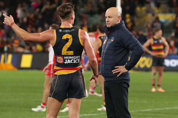 Adelaide’s Ben Keays with coach Matthew Nicks.