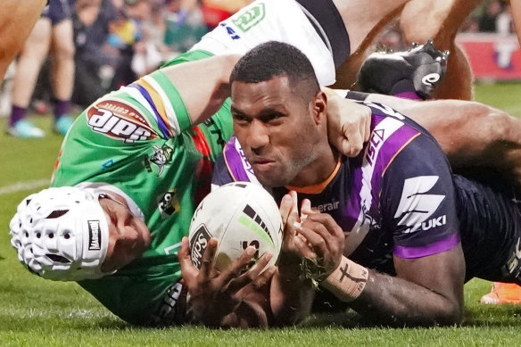 Melbourne Storm's Suliasi Vunivalu, right, has been linked with a move to rugby union. 