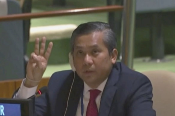 Myanmar Ambassador to the United Nations Kyaw Moe Tun flashes the three-fingered, a gesture of defiance used by protesters in Myanmar, at the end of his speech to the UN General Assembly in February. 