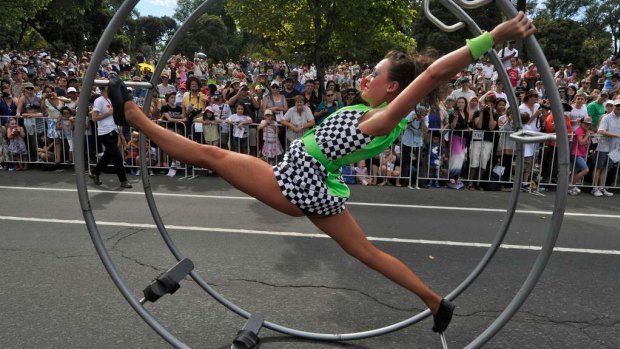 An acrobat takes part in the Moomba parade.