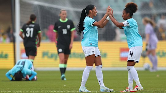 Panama celebrate their win against Australia as the full-time whistle blows.