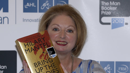 Hilary Mantel, winner of the Man Booker Prize for Fiction, poses with a copy of her book Bring up the Bodies.