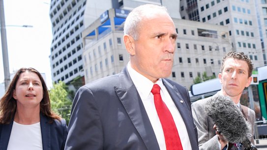 NAB chairman Ken Henry leaving the royal commission hearings in Melbourne late last year. 