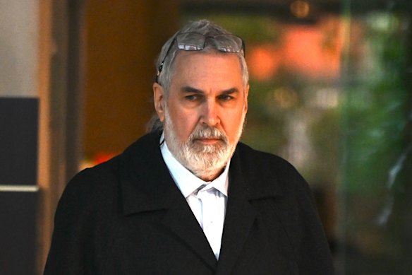 Mushroom expert Dr Tom May leaves court in Morwell on Tuesday.