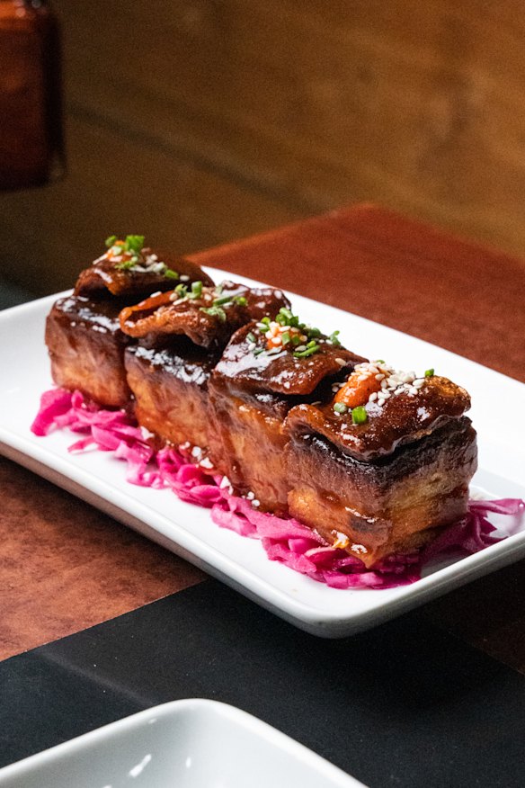 Crispy pork belly with dry pimento crackle and root beer sauce.