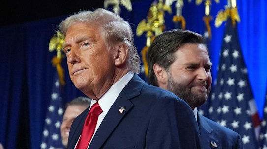 Republican presidential nominee former president Donald Trump and his running mate Senator J.D. Vance on stage in Florida.