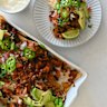 Loaded double-bean nachos with fresh pico de gallo.