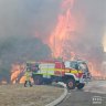 A bushfire menaced suburban homes in Bibra Lake on February 20.