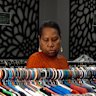 Retail assistant Dorothy Togara says the quality of secondhand clothing imported from Australia has declined over the past few decades.