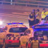 Man charged with dangerous driving over Anzac Bridge deaths, police say