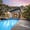 Soaring architect-designed home in the treetops fetches $5.4m at auction