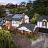 A couple bid against themselves to secure a ‘famous’ Wahroonga home at auction on Saturday for $2,905,000.