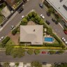Sick of neighbours? House on a giant traffic island for sale