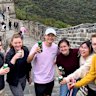 Ciara Morris, second from left, with Peking University classmates on the Great Wall of China in 2019.
