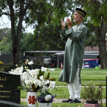 Kazi Ali OAM prays in the Muslim section of Kemps Creek Memorial Park.