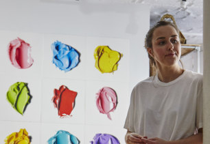 Cj Hendry in front of her hand-drawn work in Brooklyn, New York. 