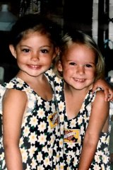 Phoebe (at left) with her friend Lily in matching dresses.