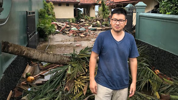 Kevin Resali, 36, outside the villa in Anyer where he and his family were staying when the tsunami hit.
