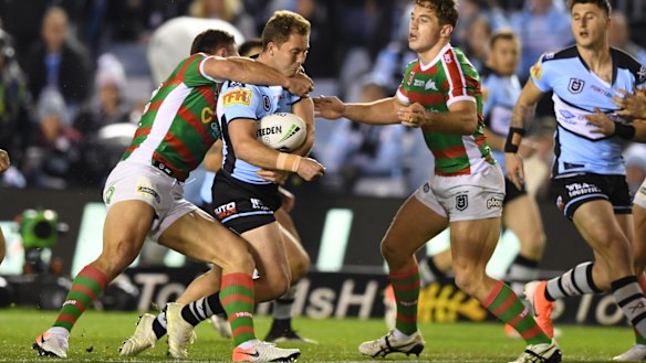 Matt Moylan is still feeling the effects of this hit from South Sydney's Sam Burgess.