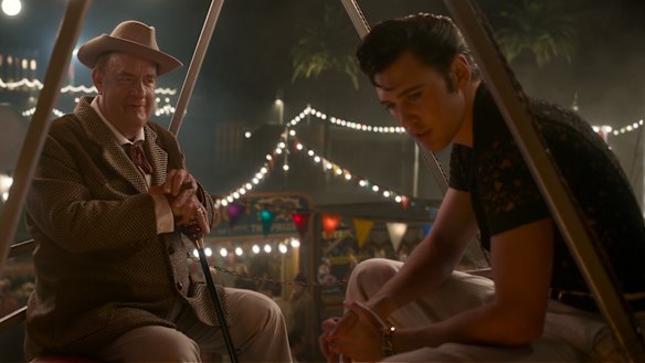 Tom Hanks playing Colonel Tom Parker opposite Austin Butler, right, in Baz Luhrmann’s Elvis.
