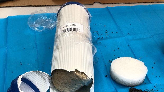 MDMA allegedly hidden in a water filter mailed from Switzerland.