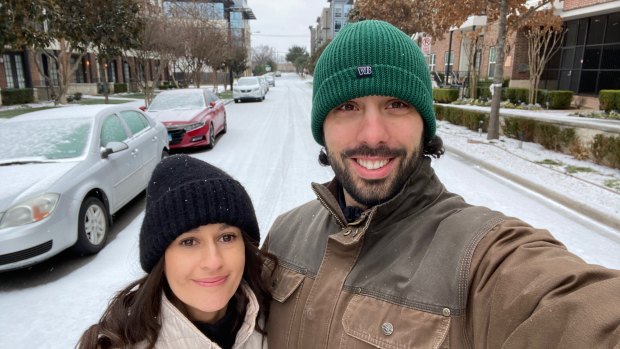 Australian expats Emilia and Daniel Carrasco were excited to see snow for the first time before their power went down. 