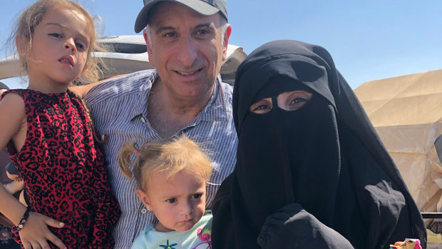 Kamalle Dabboussy with his daughter Mariam and her daughters Aisha (left) and Fatema in al-Hawl camp in north-eastern Syria.