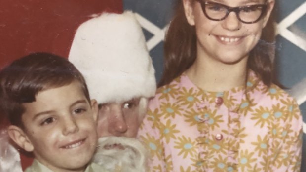 William and Jeannette Oliver with Santa. Brother and sister were both sexually abused by their podiatrist, but neither told anyone until they were adults. 