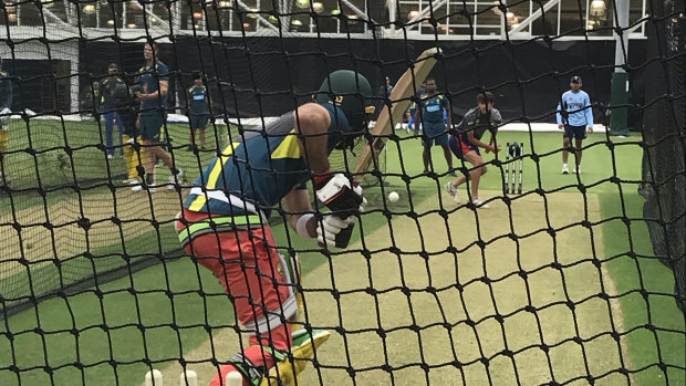 New look: Glenn Maxwell trying out his coral pants on Thursday at training ahead of Saturday's ODI at the SCG. 