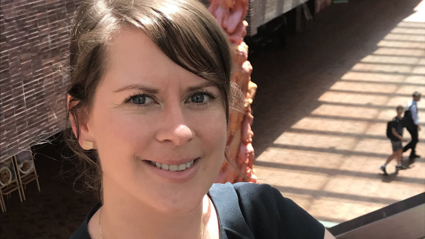 Australian Julia Bowes, an assistant professor at the University of Hong Kong, stands in front of the university memorial to the Tiananmen Square massacre.