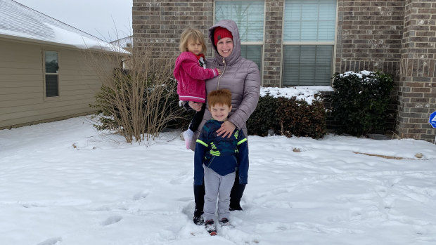 Rebekah Sawyer with children Wyatt and Emma outside their home in Fort Worth, Texas.