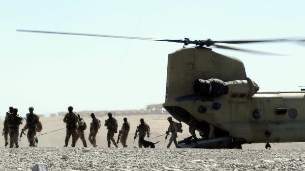 Australian special forces troops arrive back at base after a mission in Oruzgan province in Afghanistan.