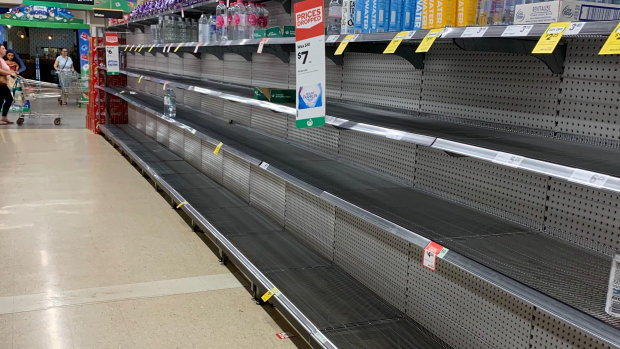 Water flying off the shelves at Woolworths, Port Hedland as a tropical cyclone looms off the coast. 