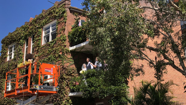 A couple creatively used a scissor lift to circumnavigate the government's strict wedding laws. 